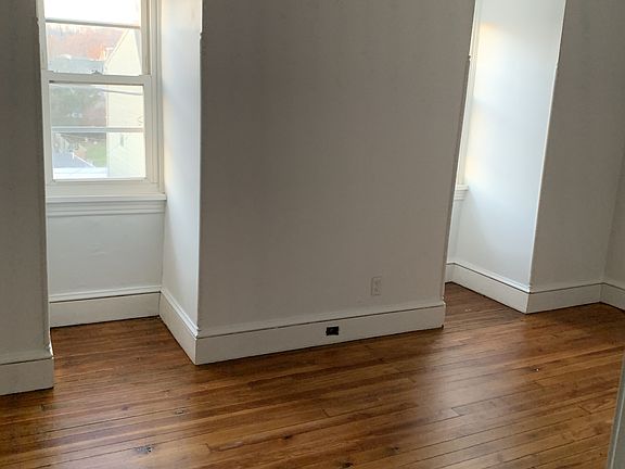Bedroom with plenty of natural light! (Windows face Walnut St)