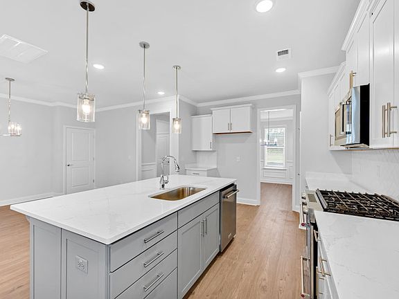 Prepare a delicious meal in the gourmet kitchen with a stainless steel dishwasher for an easy clean-