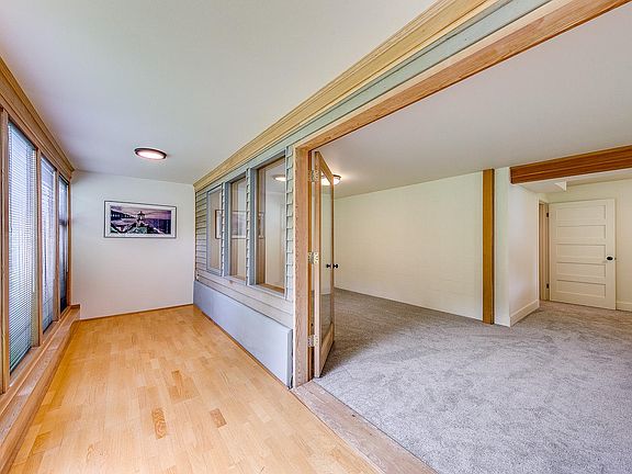 Sunspace can be closed off or open for dining room or office. Back corner is bed area.