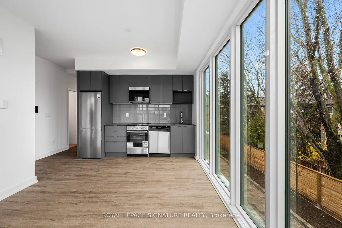Building Photo - 4569 Kingston Rd #211