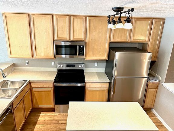 All new stainless dteal appliances, ceiling high cabinets with pull out shelves on bottom cabinets.