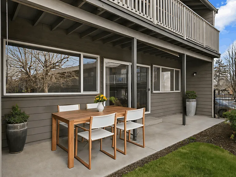 Private patio with space for outdoor dining and relaxation Private patio with space for outdoor dining and relaxation