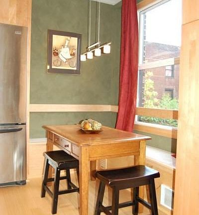 The window seat in are hides extra storage. 