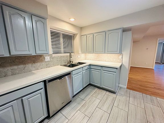 kitchen with stainless steel dishwasher