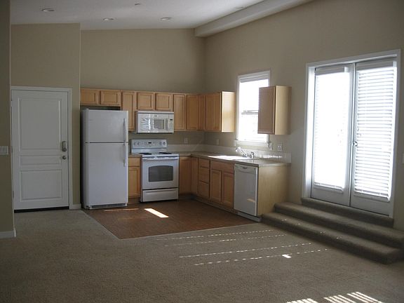 Open loft style kitchen and living area. Stair go to deck a