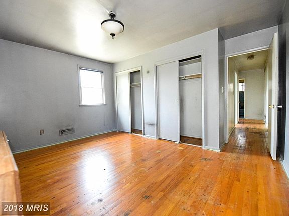 Master Bedroom with Wood Floors