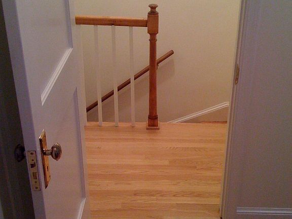 Stairs to hallway from bedroom/office New Hardwood (2008)