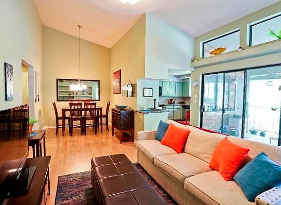 Family room and dining room. Gorgeous vaulted ceilings!