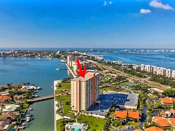 aerial view looking West along The Bayway at the Gulf of Mexico, with the building in the foreground