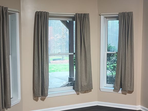 Breakfast room with bay windows.