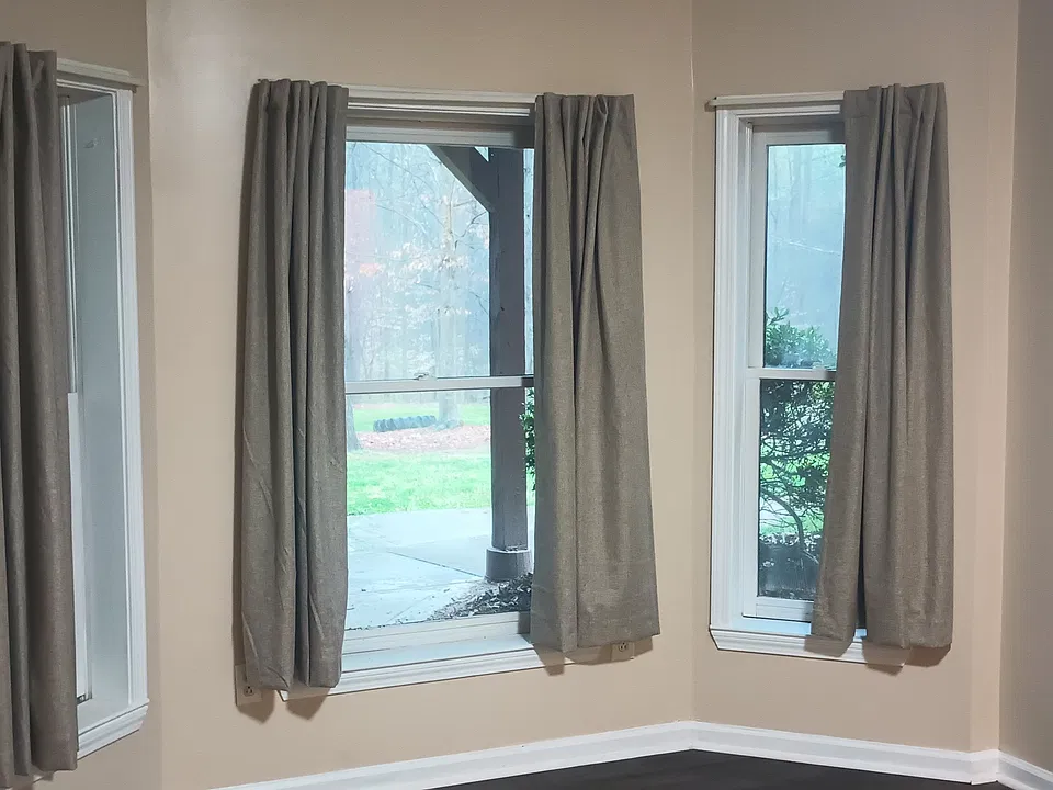 Breakfast room with bay windows.