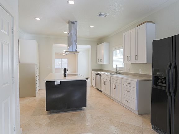 Updated kitchen. Refrigerator stays.
