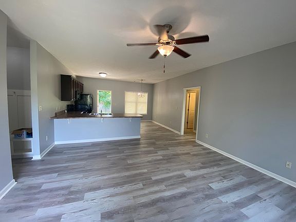 Great room, ready for entertaining with mud room on the left, leading to the garage and master suite, and bedrooms 2, 3 and 4 to the right