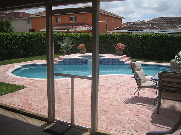 screened in tiled porch