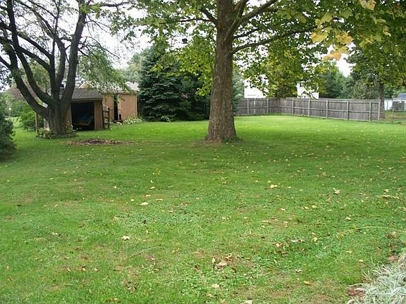 Back yard with sheds