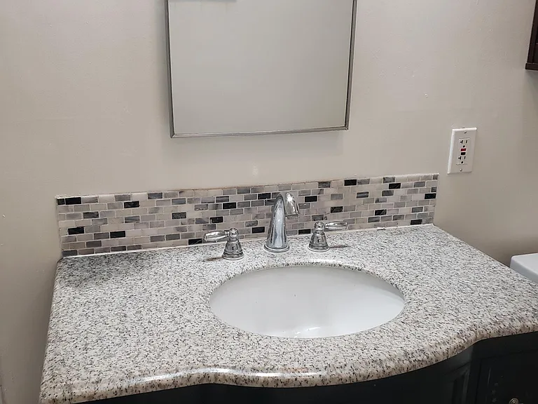 Nice sink with plenty of storage drawers and cabinets