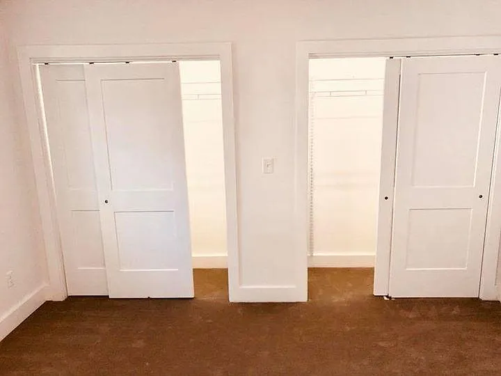 Double closets in Master with storage above