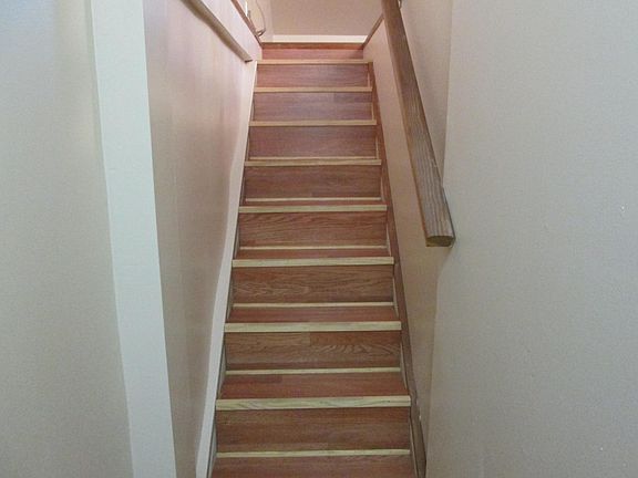 Stairs indoors to upstairs living space
