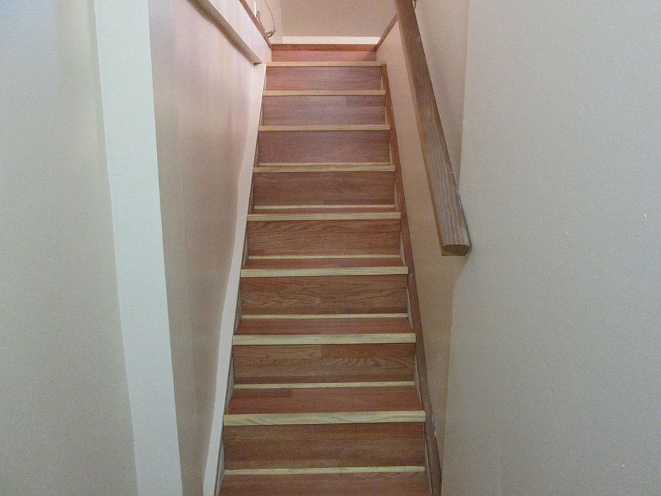 Stairs indoors to upstairs living space