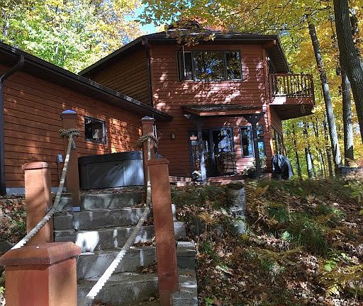 house approach from lakeside