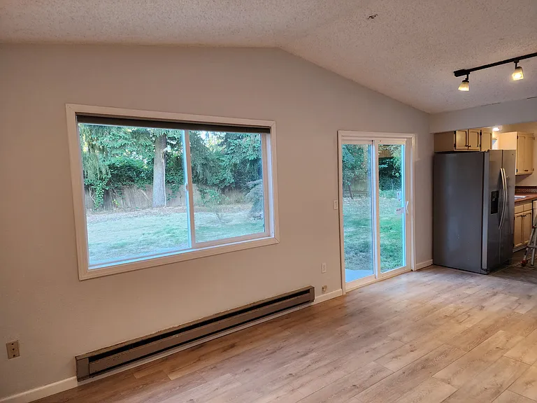 Family Rm 2 with view of spacious private back yard