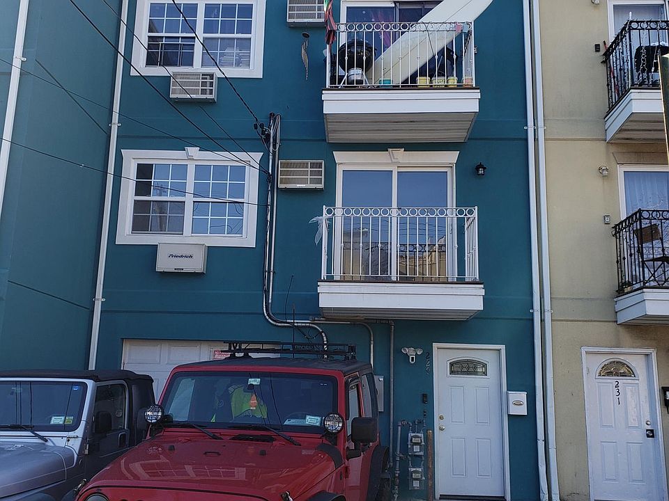 Freshly Painted Building with A Renovated 2 nd Floor Rental and Private Parking