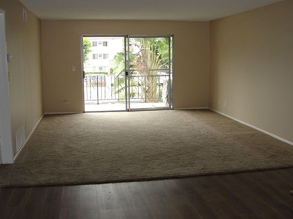 Living room (17' x 14' 4") view from kitchen.