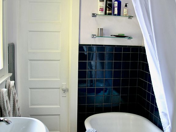 Bathroom with Claw Foot Tub and Shower.