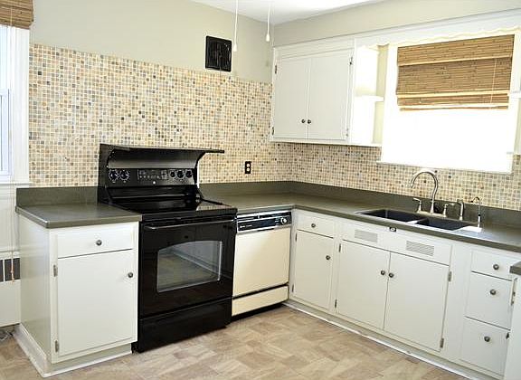 Updated w/Corian counters & tile backsplash