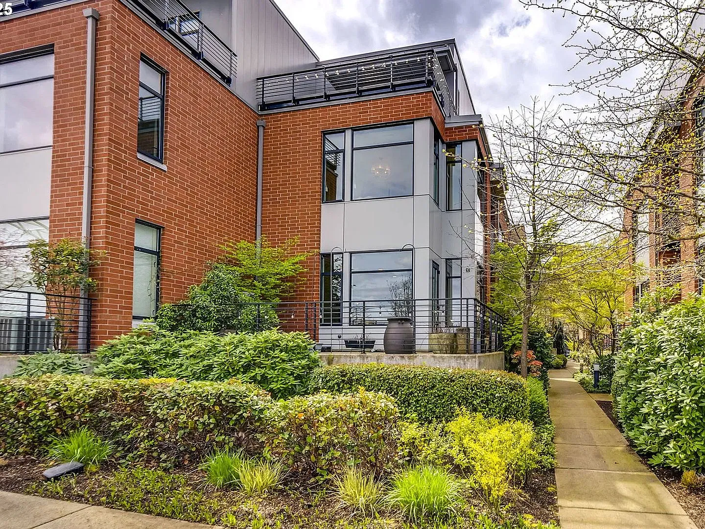 Luxury Riverfront Condo! Stunning Views, Multiple Outdoor Spaces & Private Garage — Photo 2
