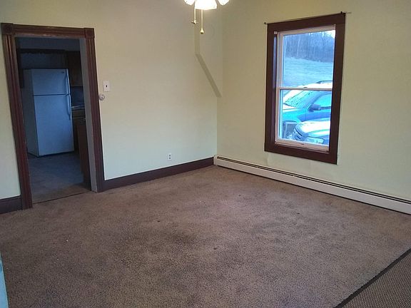 dining room looking into kitchen, opens to the living room on two sides