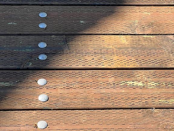 Newly redone custom wood driveway.