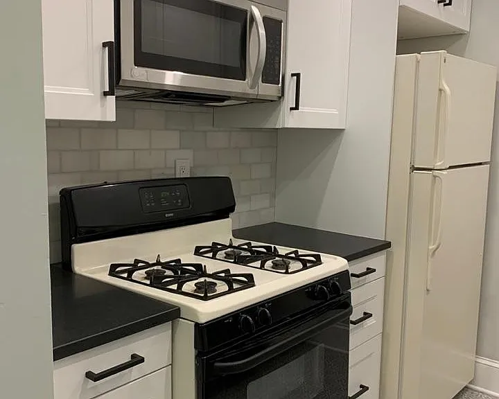 New cabinets, tile, backsplash, microwave