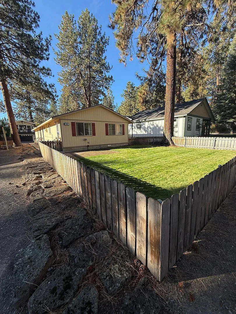 Westside Living at Its Best! Charming 3-Bedroom Home with 2-Car Garage, Patio & Lawn Care Included! — Photo 1
