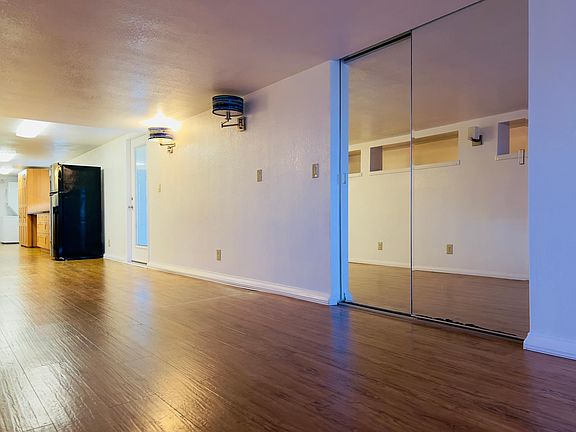 left side passing small foyer 2nd lighted mirrored large closet