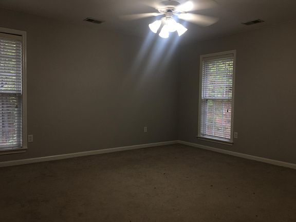 Bedroom 2 - approximately 15.5' x 14' - carpet not yet replaced