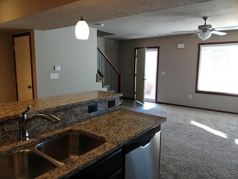Granite island. Coat closet.