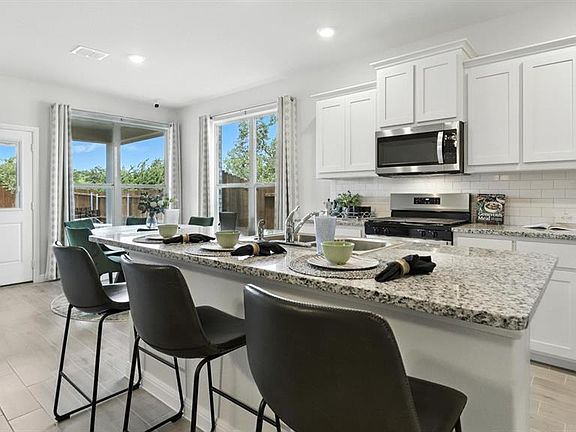 Kitchen - All Home and community information, including pricing, included features, terms, availability and amenities, are subject to change at any time without notice or obligation. All Drawings, pictures, photographs, video, square footages, floor plans, elevations, features, colors and sizes are approximate for illustration purposes only and will vary from the homes as built.