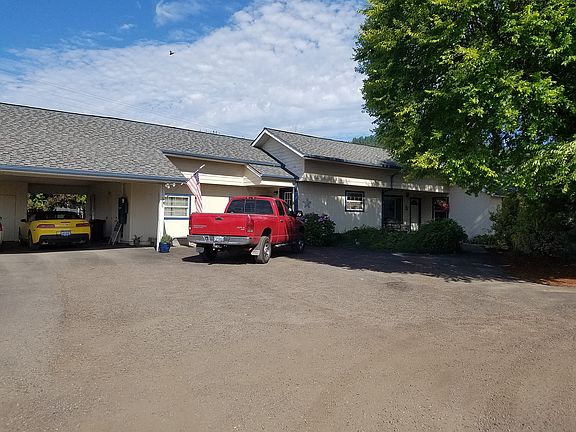 Front view w/carport