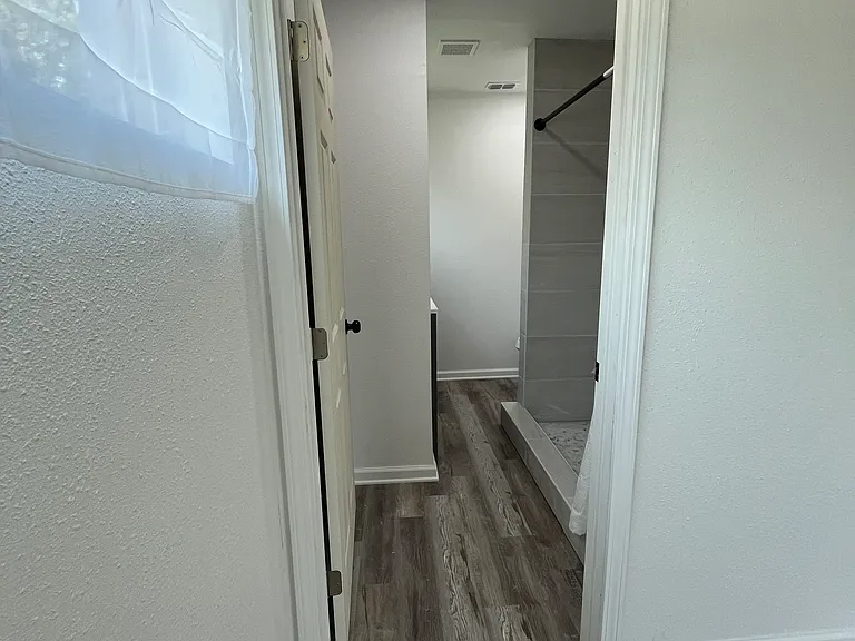 Adjoining, private master bathroom
