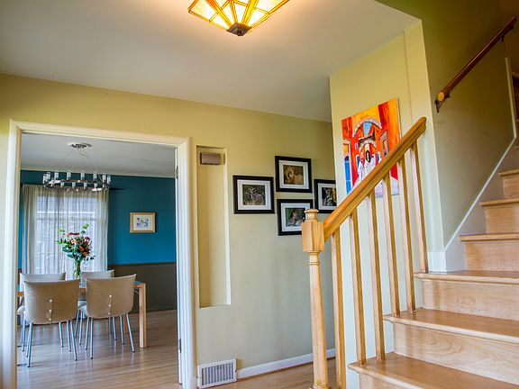 Main landing connects to dining and living rooms.