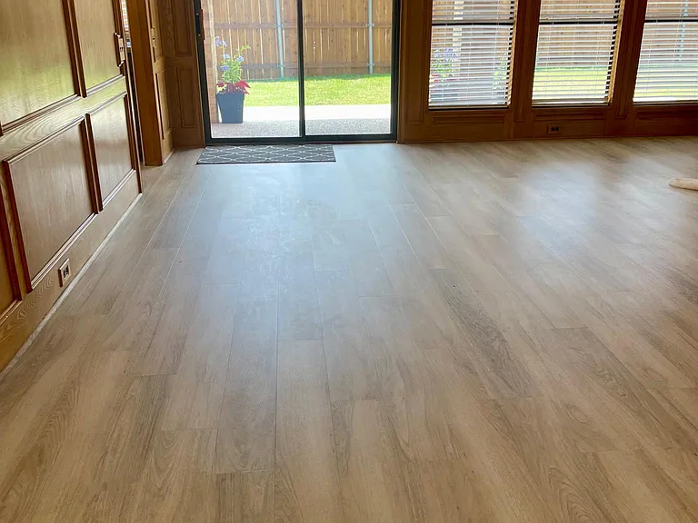 Entrance to home:
Great Room to Covered Quiet Patio
White Oak Luxury vinyl