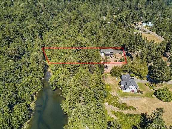 Property Backs up to Saltwater Lagoon with Trail to Shoreline