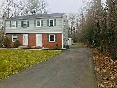 Private driveway for each unit. Front elevation