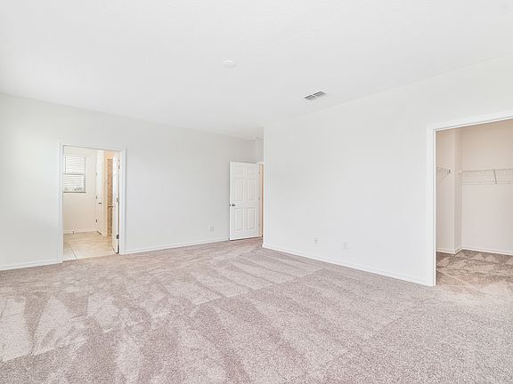 Owners suite with walk-in closet