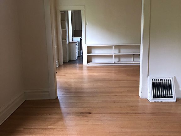 Living room looking into dining room.