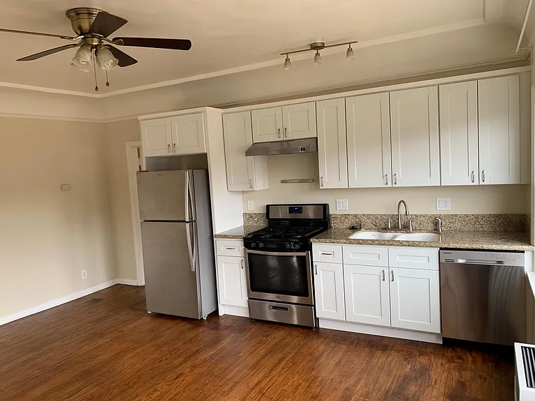 FULLY UPGRADED KITCHEN WITH ALL NEW CABINETS, STAINLESS STEEL APPLIANCES AND NEW GRANITE COUNTERTOP