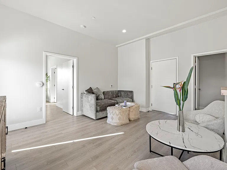 Step into a modern oasis of calm and relaxation in this beautifully designed living room space'
