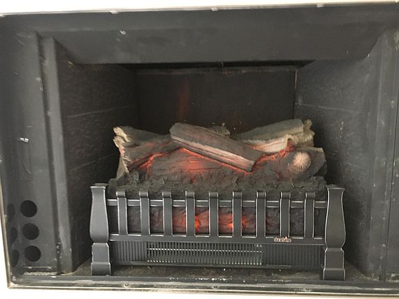 Electric fire place with heat & sound.