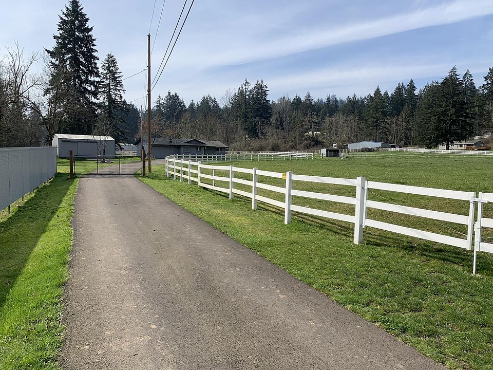 Driveway with house, shop, pasture and barn